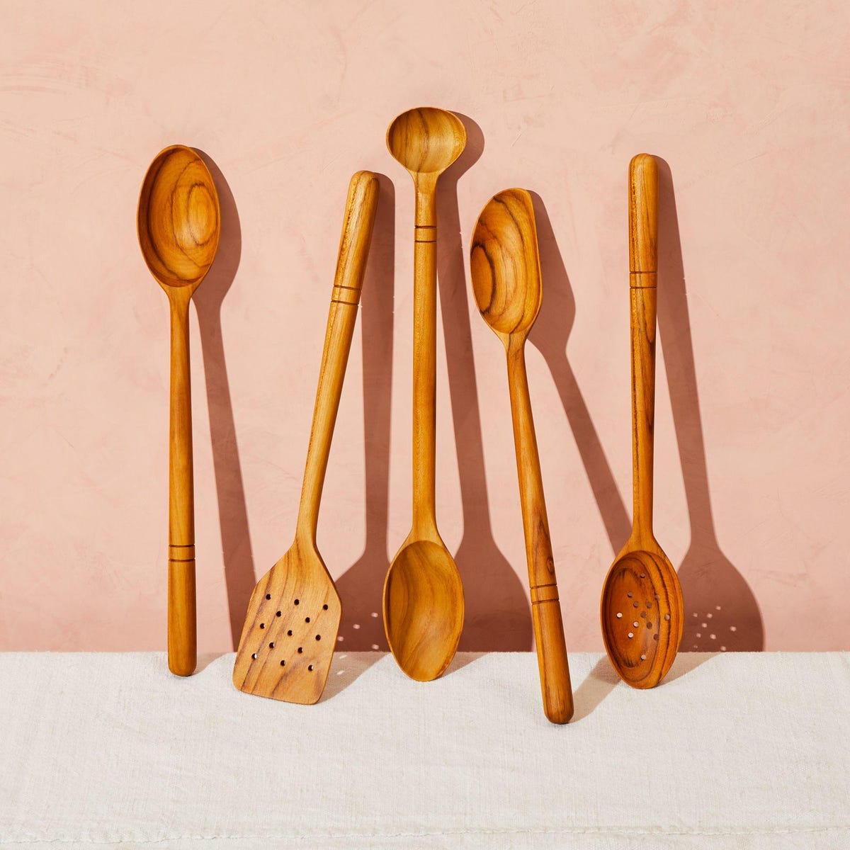 five wooden spoons